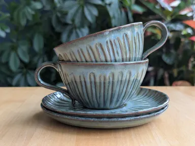 Kopjes met schoteltjes